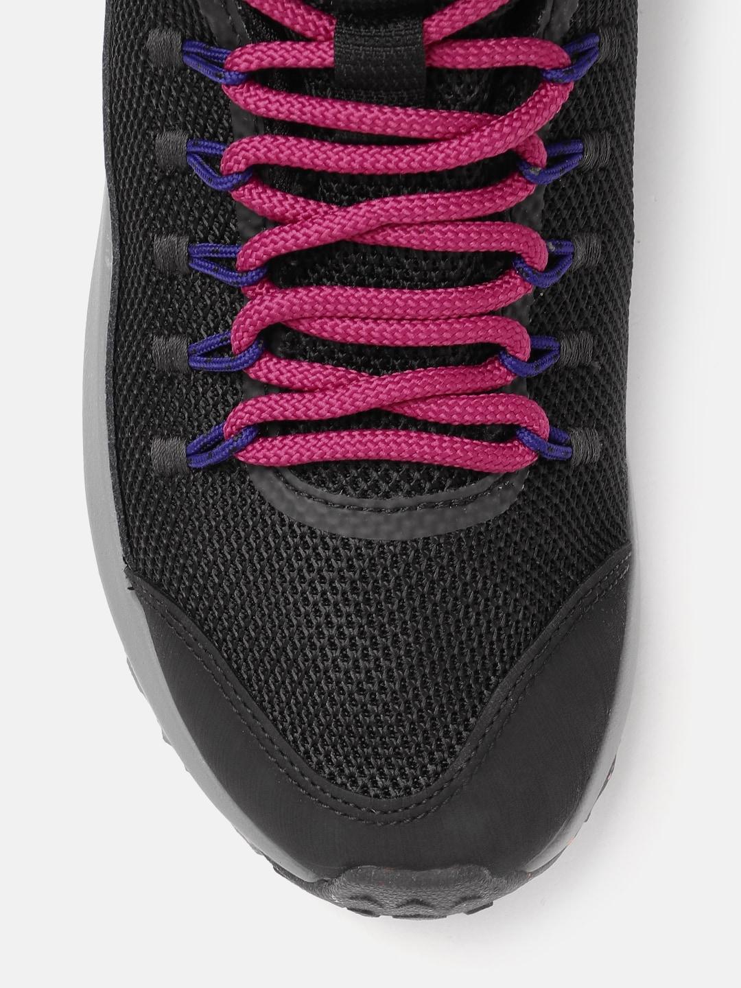 A Women Wearing Columbia Women Black TRAILSTORM MID WATERPROOF OMNI HEAT