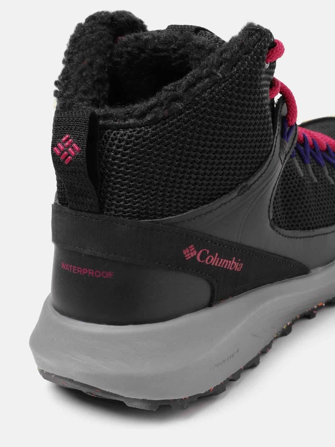 A Women Wearing Columbia Women Black TRAILSTORM MID WATERPROOF OMNI HEAT