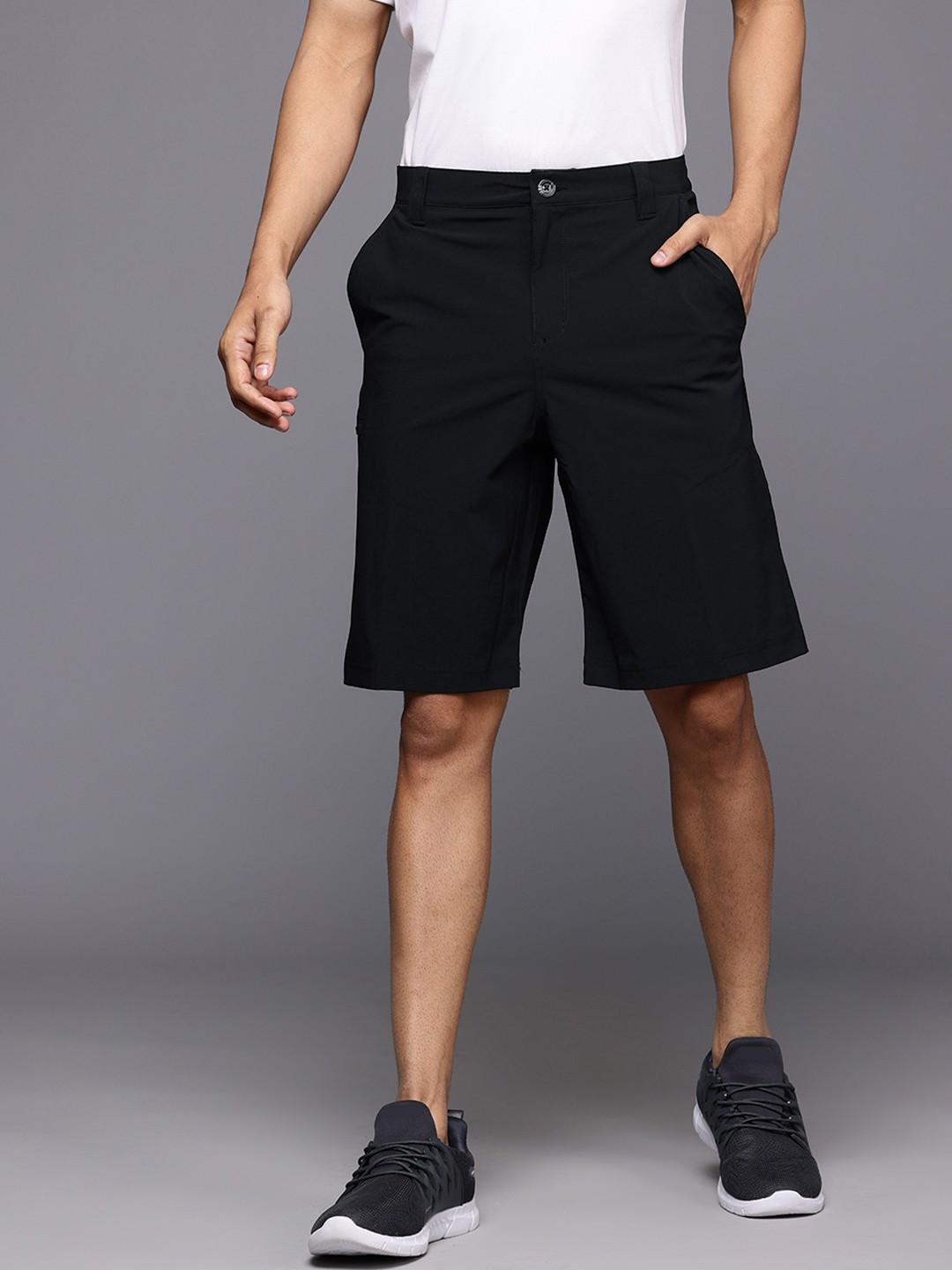 A Men Wearing Columbia Men Black Grander Marlin III Offshore Short (Sun Protection)