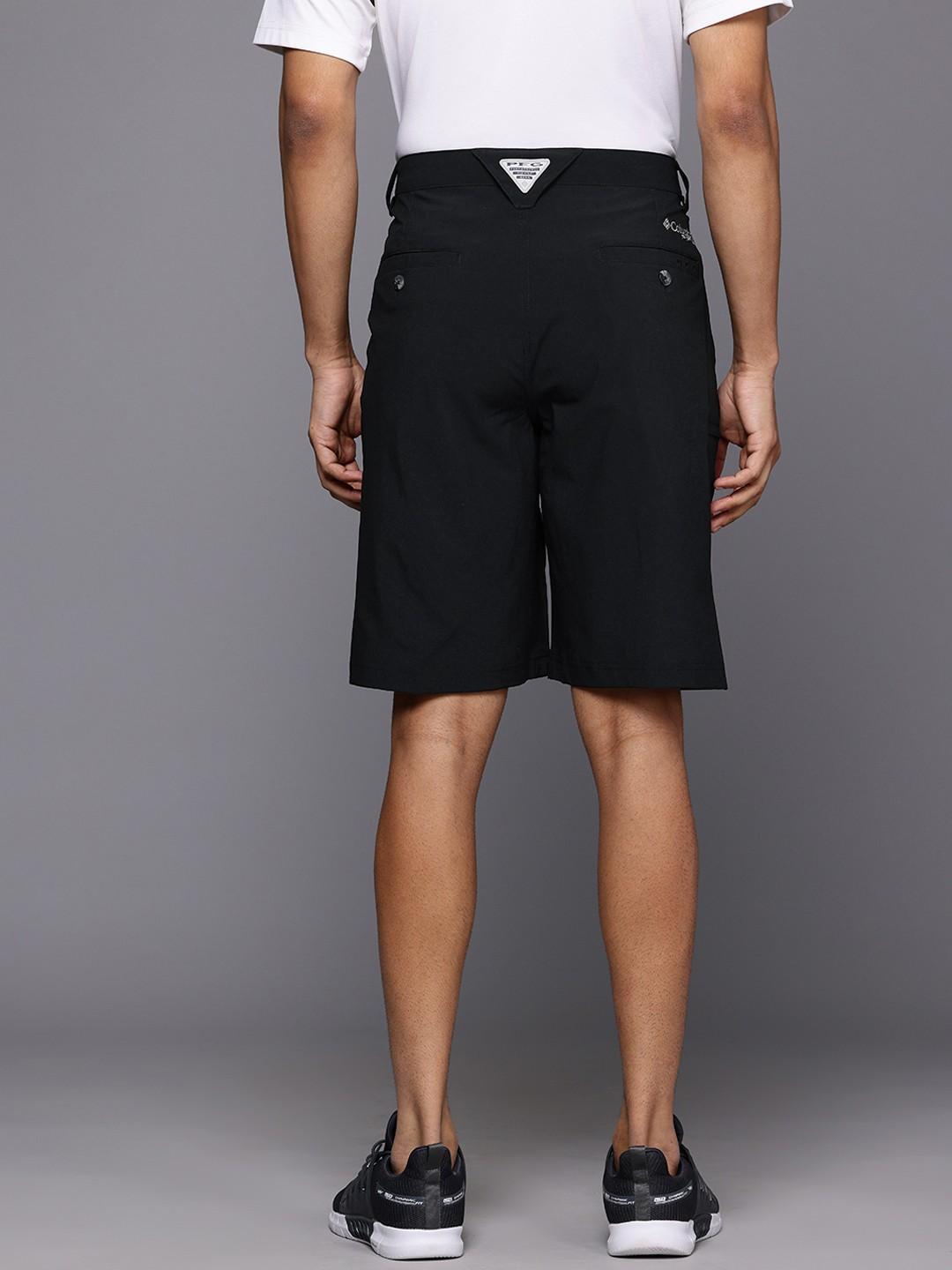 A Men Wearing Columbia Men Black Grander Marlin III Offshore Short (Sun Protection)