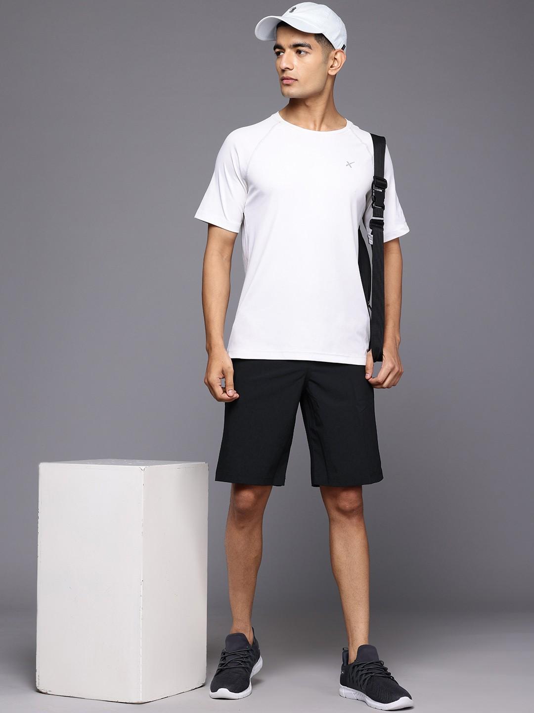 A Men Wearing Columbia Men Black Grander Marlin III Offshore Short (Sun Protection)