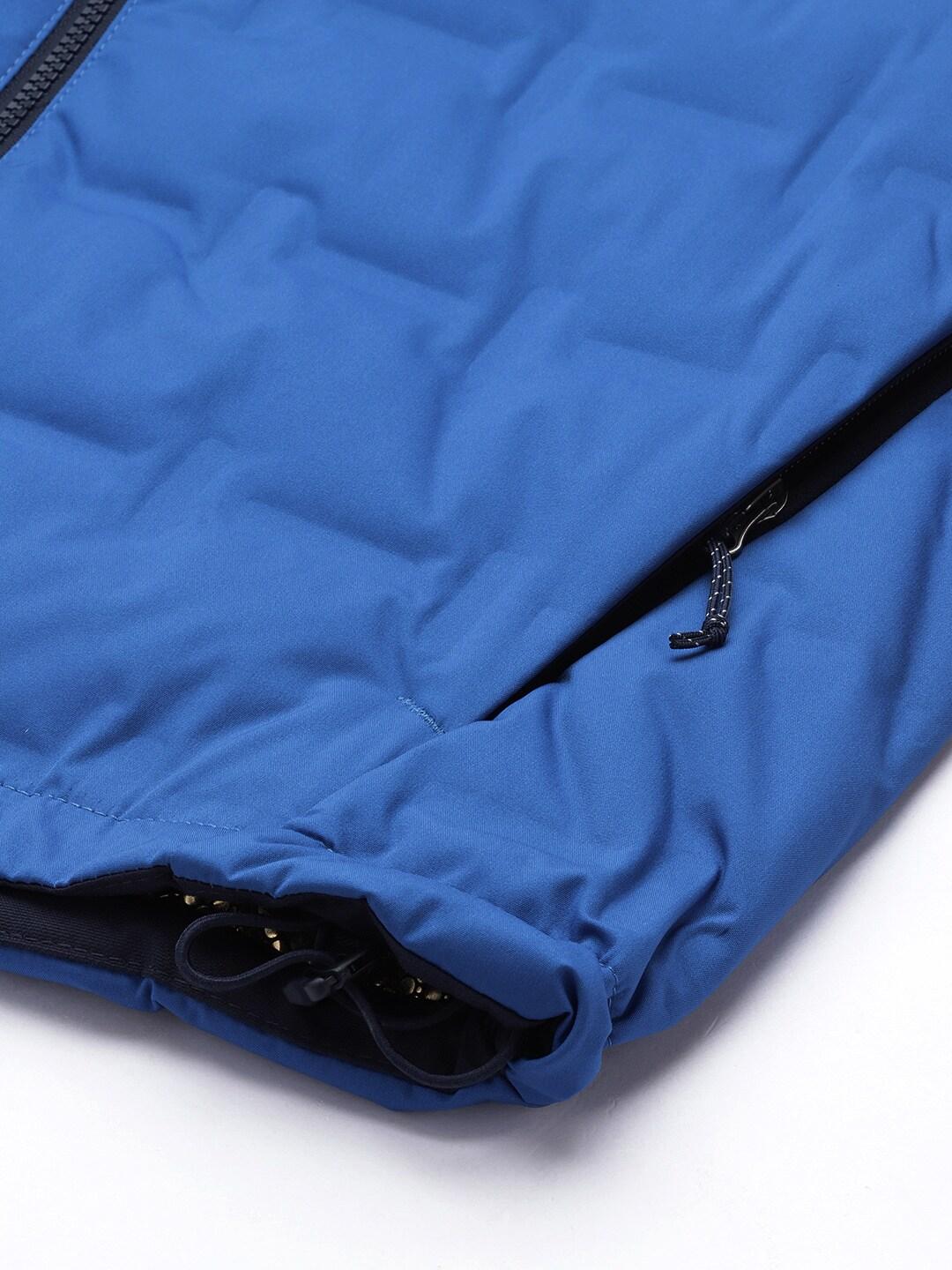 A Men Wearing Columbia Men Blue Grand Trek II Down Hooded Jacket