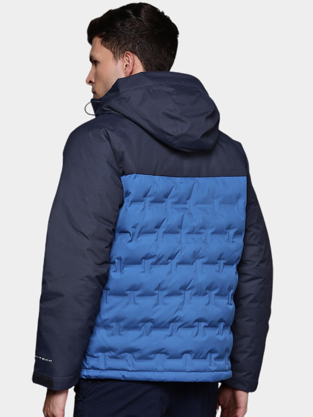 A Men Wearing Columbia Men Blue Grand Trek II Down Hooded Jacket