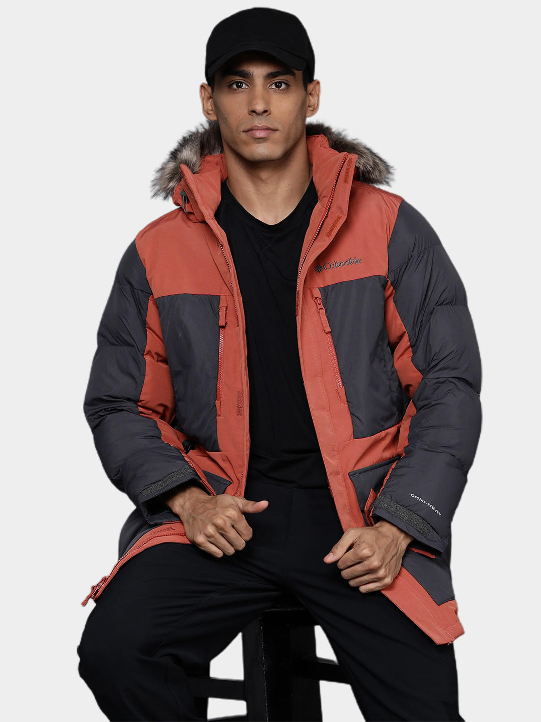 A Men Wearing Columbia Men Orange Marquam Peak Fusion Parka