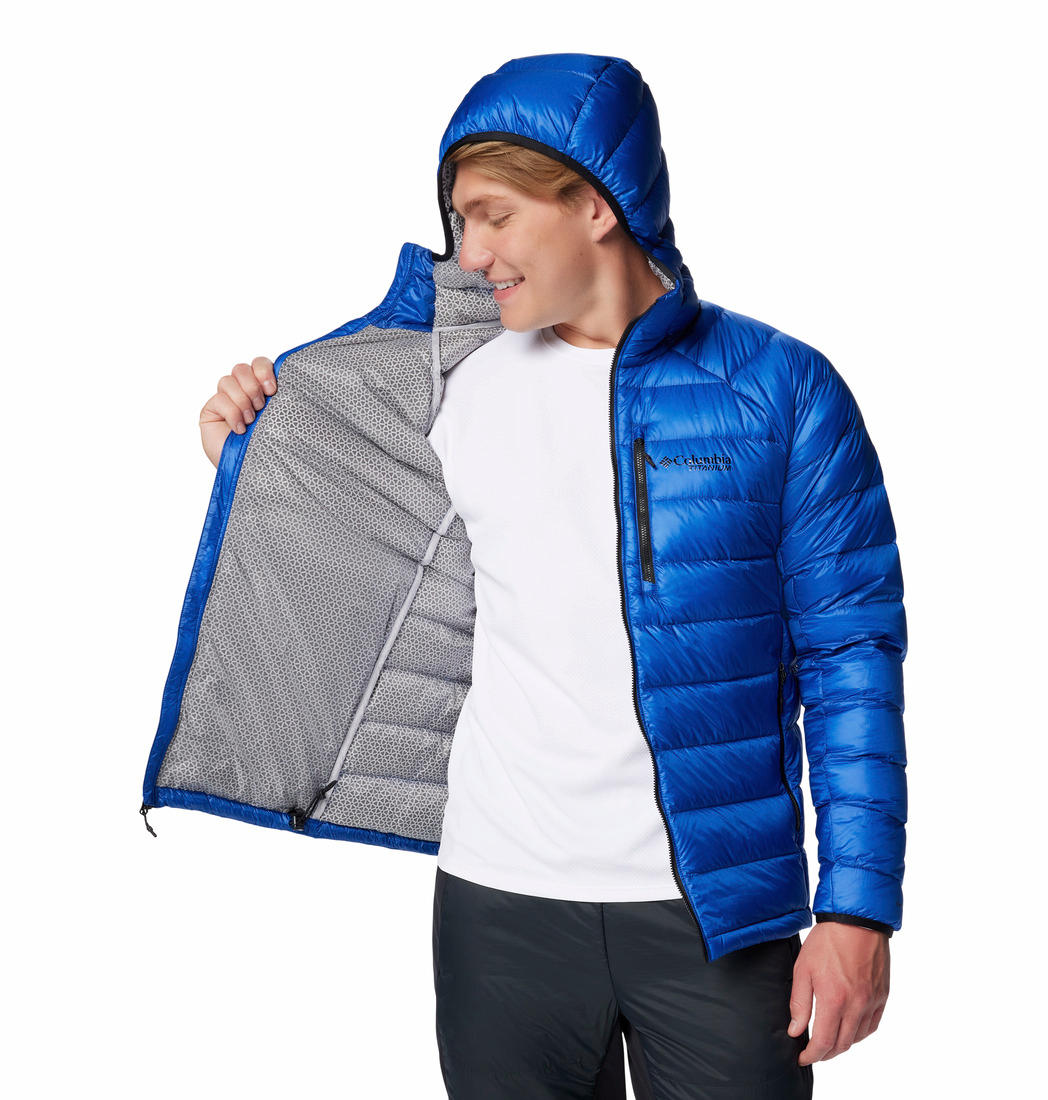 A Men Wearing Columbia Men Blue Arctic Crest Down Hooded Jacket