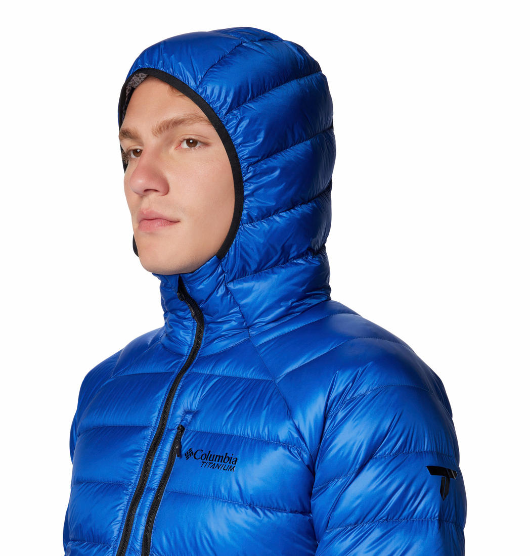 A Men Wearing Columbia Men Blue Arctic Crest Down Hooded Jacket