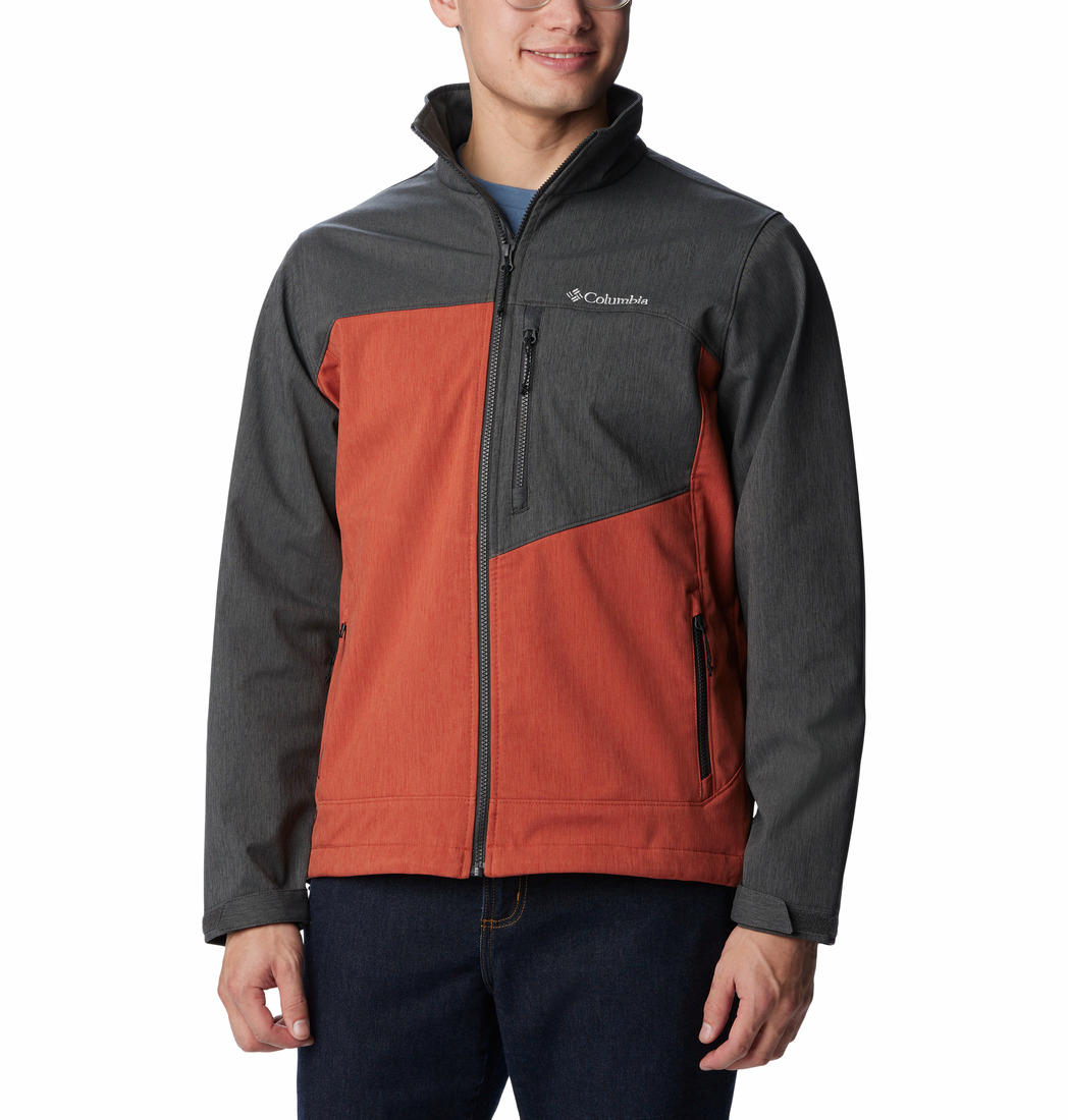 A Men Wearing Columbia Men Orange Cruiser Valley Softshell Jacket
