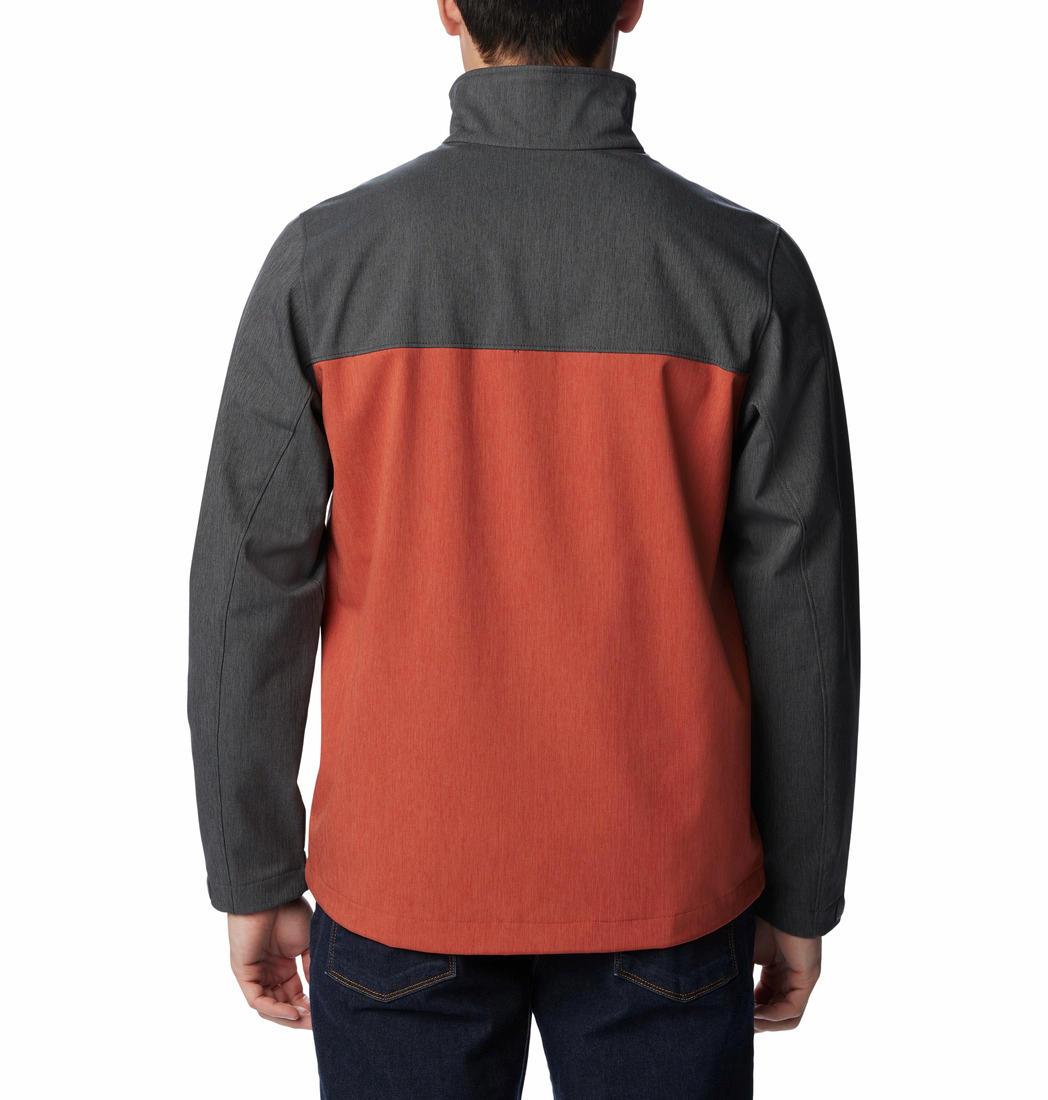A Men Wearing Columbia Men Orange Cruiser Valley Softshell Jacket