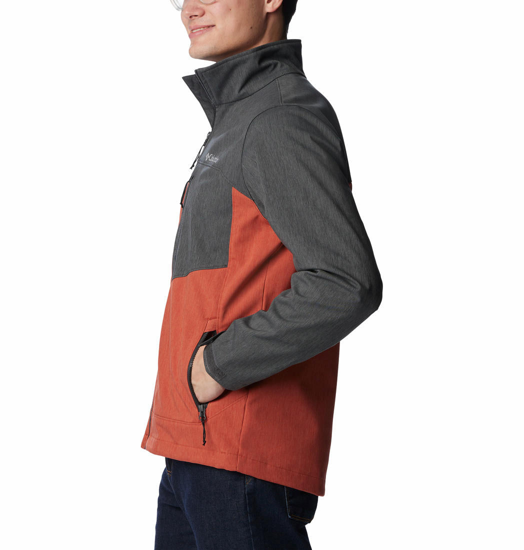 A Men Wearing Columbia Men Orange Cruiser Valley Softshell Jacket