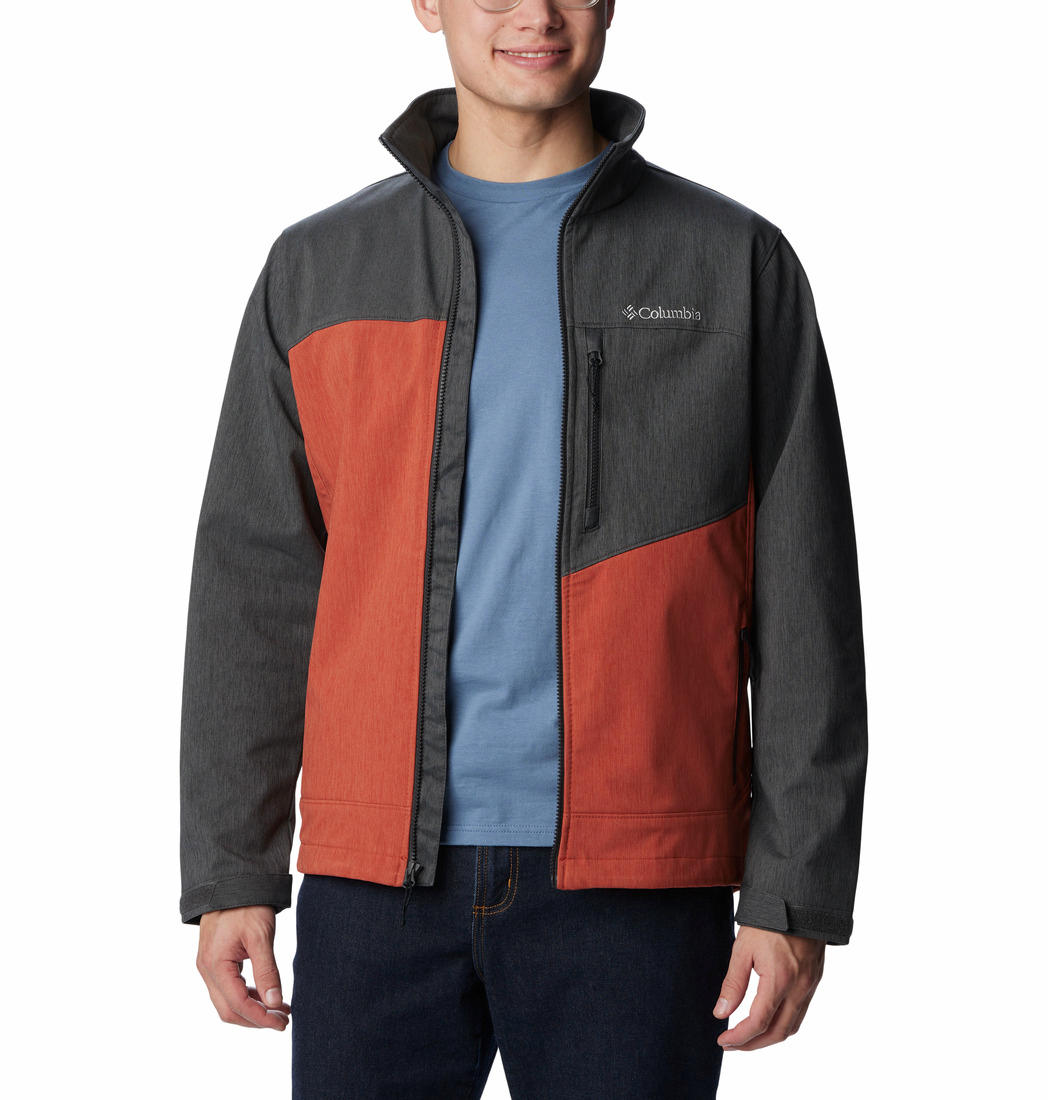 A Men Wearing Columbia Men Orange Cruiser Valley Softshell Jacket